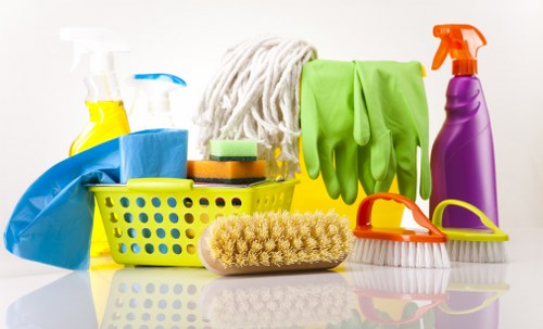 Carpet cleaner preparing equipment before starting a safe cleaning job